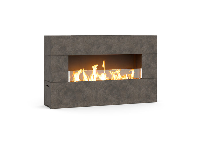 American Fyre Designs Milan Low 211-LO outdoor fireplace in Dark Basalt, manual-control family photograph; decorative media shown sold separately