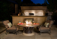 Official American Fyre Designs 770 manufacturer photograph; shown finish and optional decorative media are illustrative. Propane cylinder and site furnishings, where pictured, are not included.